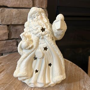 Porcelain Santa with snow Crystals. Brand New. 9.5 Inches tall.